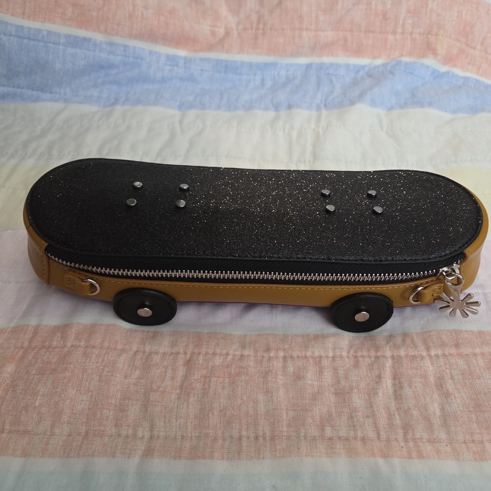 Dolls Kill Black and Gold Skateboard Crossbody Bag